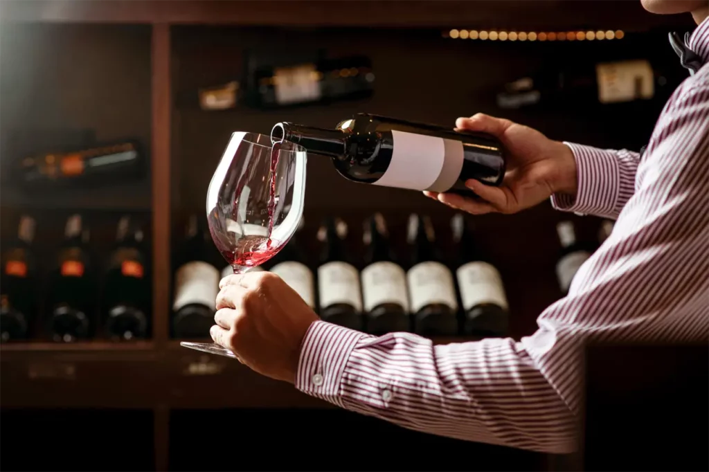 handsome young sommelier wine shop x
